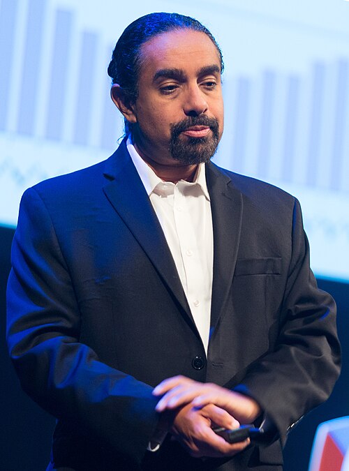 Ramez Naam speaking on stage